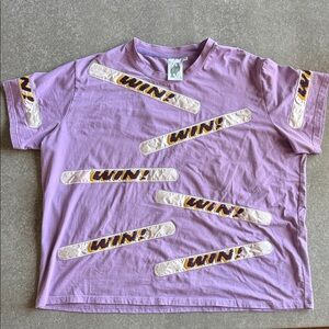 QUEEN OF SPARKLES Purple 'WIN!' Short Sleeve Tee